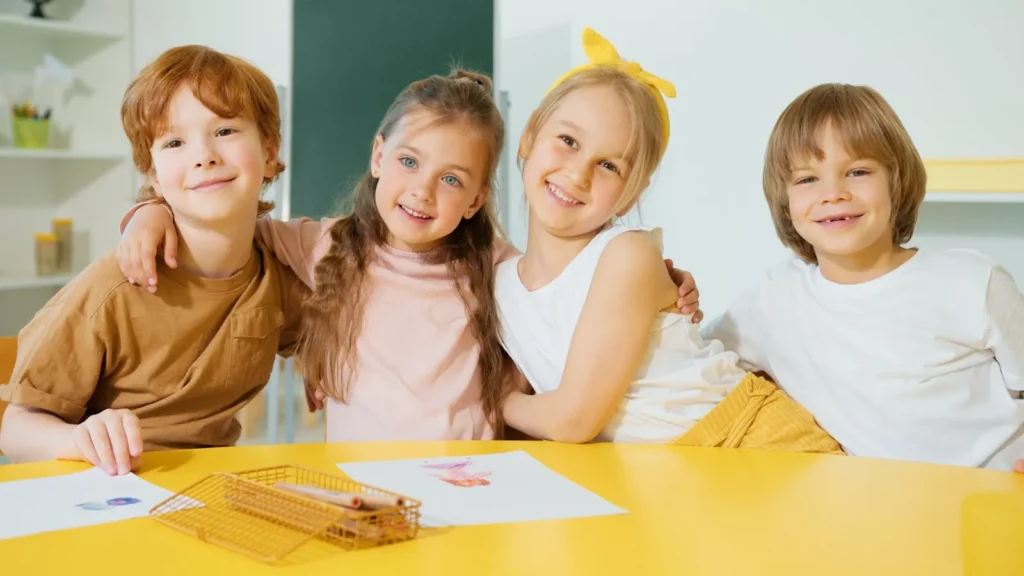 A group of cute friends sitting together and having a great time.